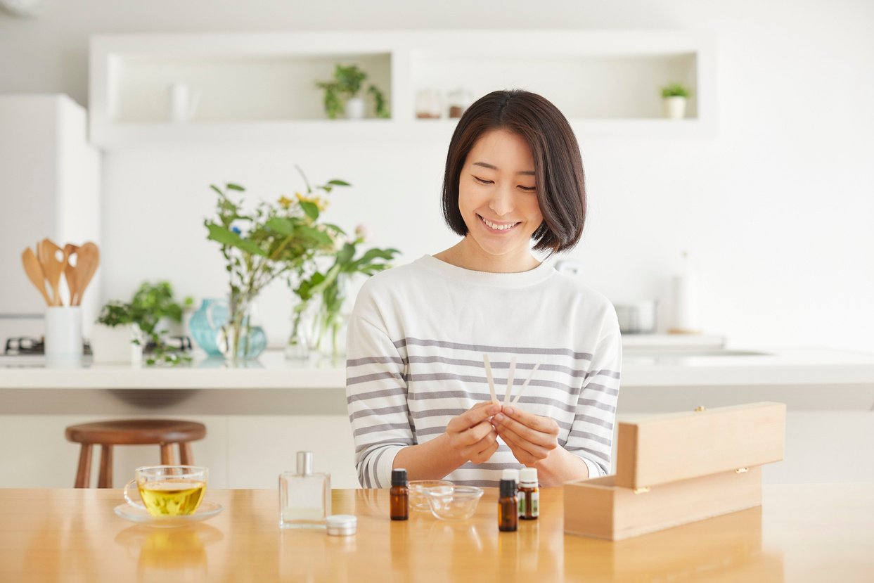 Woman Experiencing Aromatherapy with Essential Oils