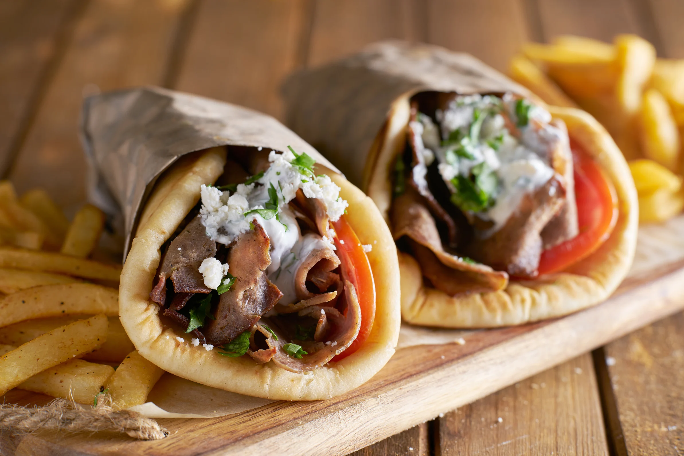 Two Greek Gyros with Shaved Lamb and French Fries