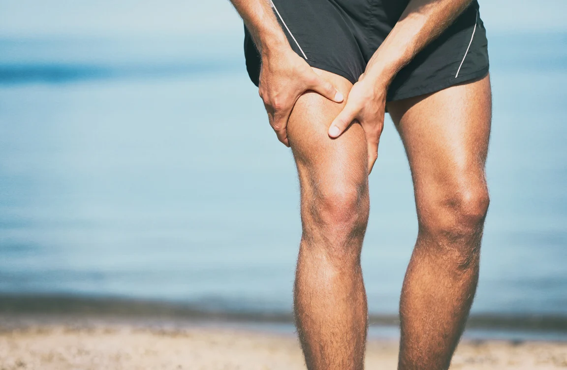 Sports Injury Muscle Cramp Pain Fit Runner Man Athlete Holding P